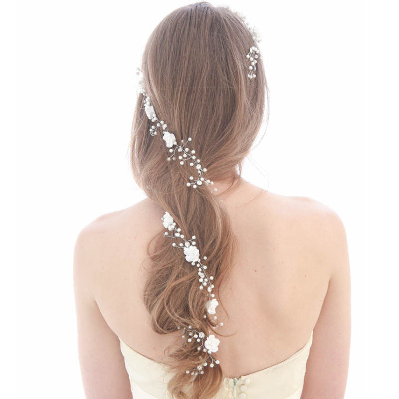 Bride's wedding handmade pearl white flowers and long soft chain hair chain