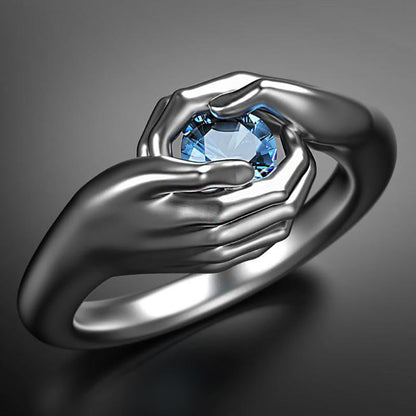 Exquisite Hands Embrace Blue Crystal Zircon Ring