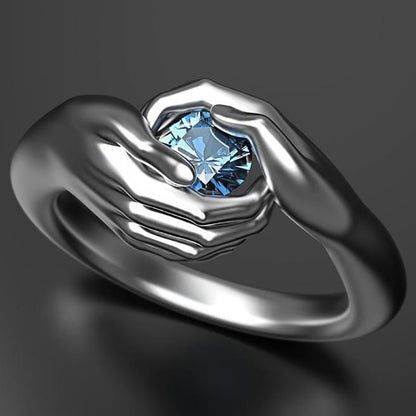 Exquisite Hands Embrace Blue Crystal Zircon Ring