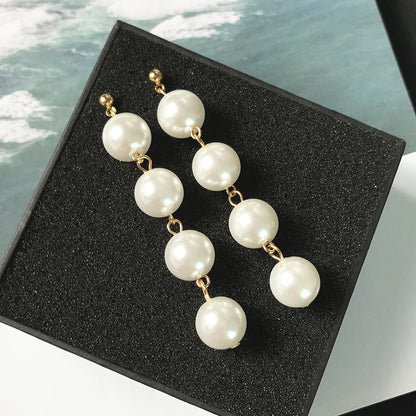 Pearl tassel long earrings