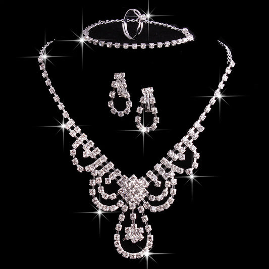 bridal suit, crystal necklace, earrings, rings, suits, four sets of jewelry