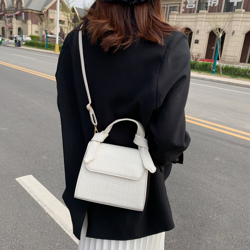 Hand-held print shoulder bag