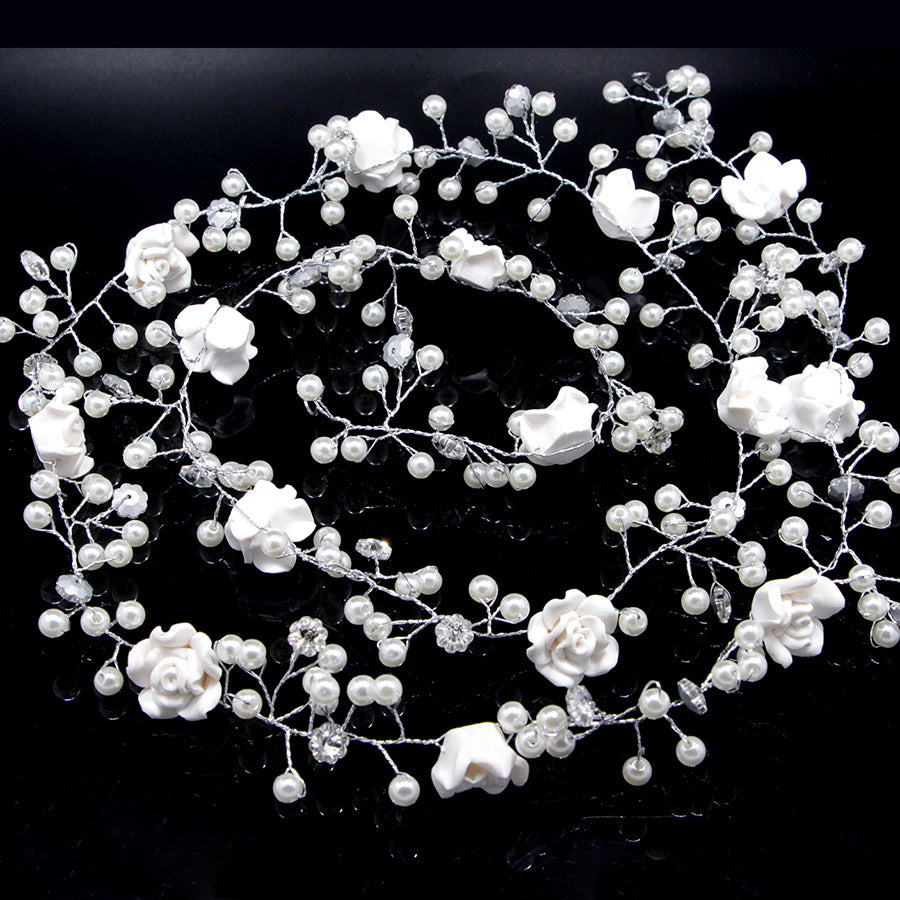 Bride's wedding handmade pearl white flowers and long soft chain hair chain