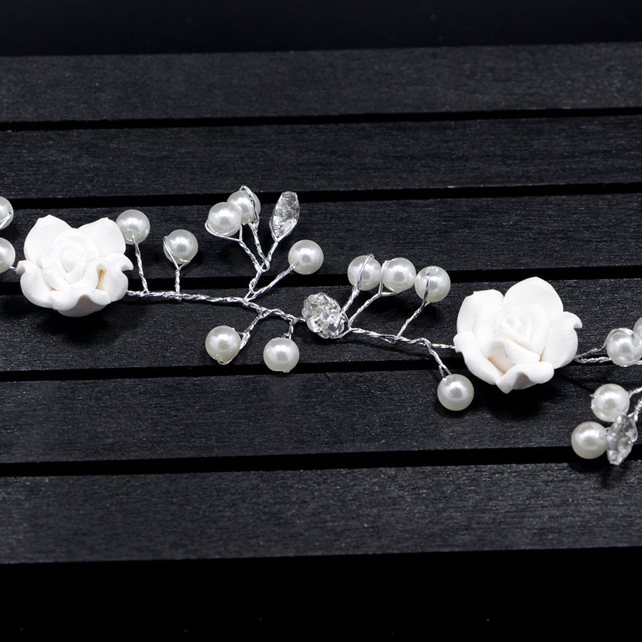 Bride's wedding handmade pearl white flowers and long soft chain hair chain
