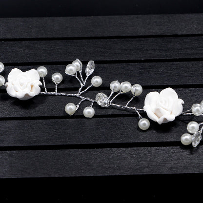 Bride's wedding handmade pearl white flowers and long soft chain hair chain
