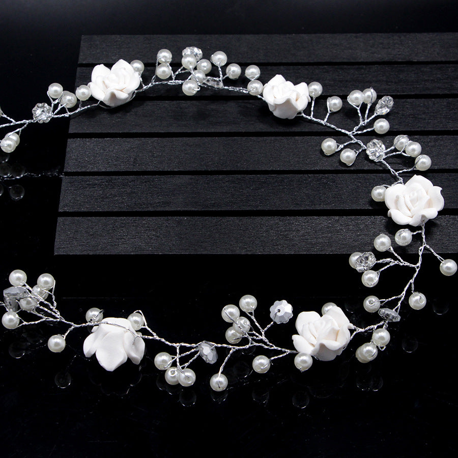Bride's wedding handmade pearl white flowers and long soft chain hair chain