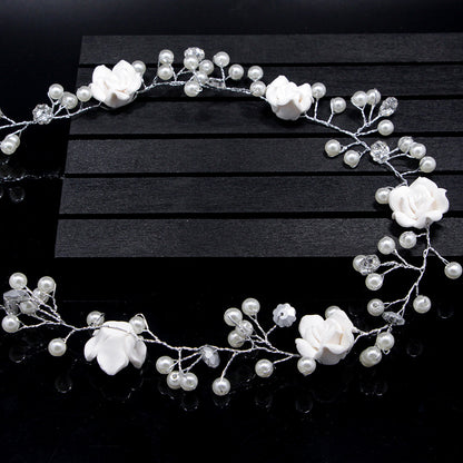 Bride's wedding handmade pearl white flowers and long soft chain hair chain