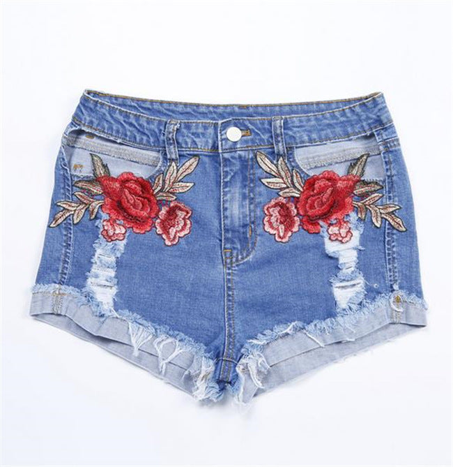 Embroidered floral stitching curled denim shorts